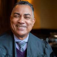 Man smiles for camera